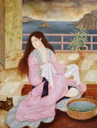 Nainen pesemässä kasvojaan